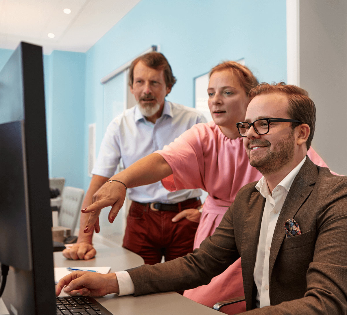 Smiling man in a meeting